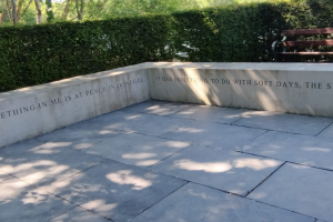 Stone bench with quote.